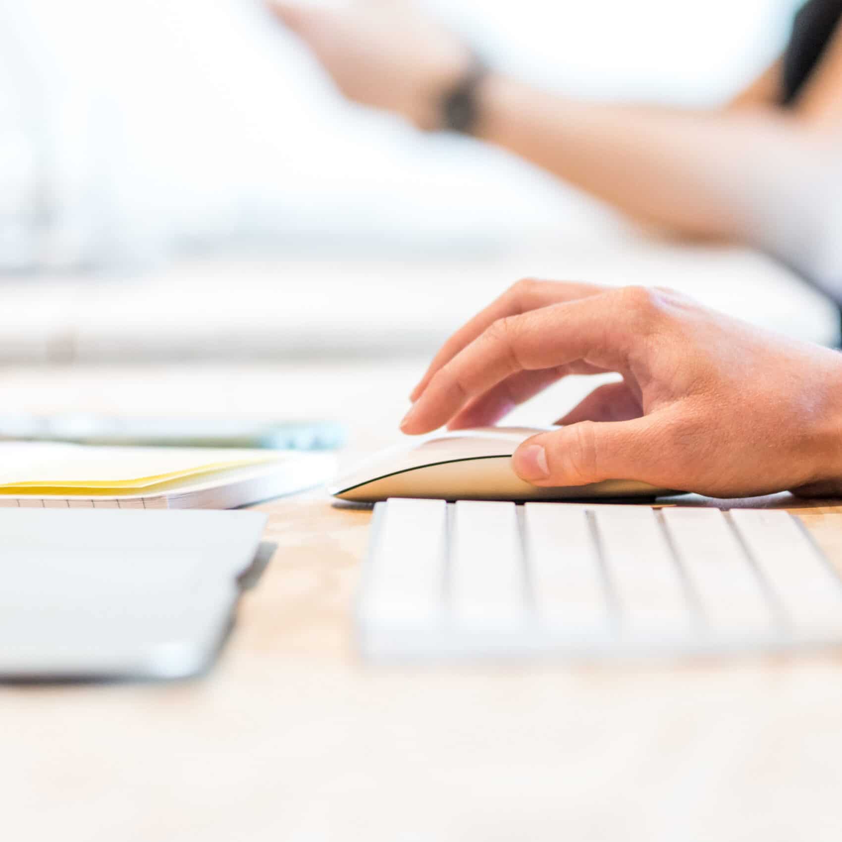 female hand on a computer mouse